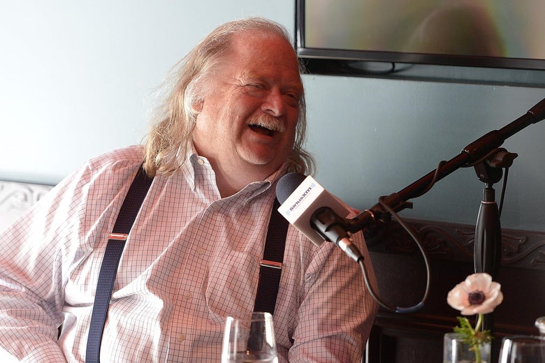 Food critic Jonathan Gold laughing during a radio interview.
